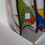 Side view of curated structured handbag