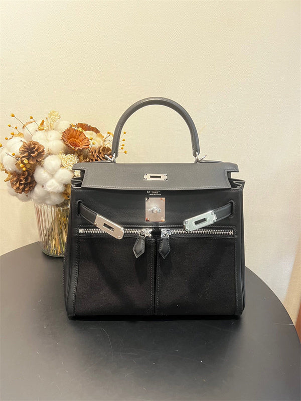 Side view of sculpted structured handbag
