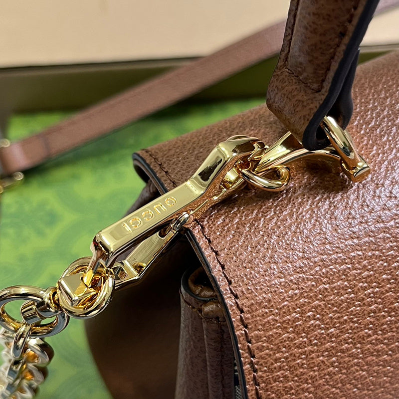 Handle and strap detail of sleek premium women's handbag – women's luxury accessory