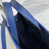 Styled lifestyle shot of statement signature women's handbag – women's everyday handbag