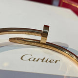 Front view of Cartier unisex jewelry piece