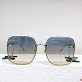 Side view of Louis Vuitton unisex sunglasses