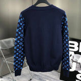 Side profile of Louis Vuitton luxury clothing with signature branding