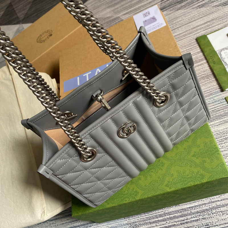 Styled lifestyle shot of classic modern women's handbag – women's statement bag