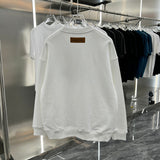 Side profile of Louis Vuitton luxury clothing with relaxed-fit cut