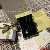 Lifestyle view of Van Cleef & Arpels unisex jewelry piece