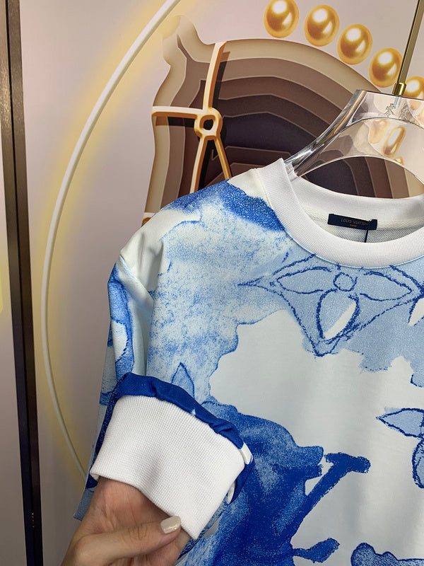 Back view of Louis Vuitton luxury clothing with signature branding