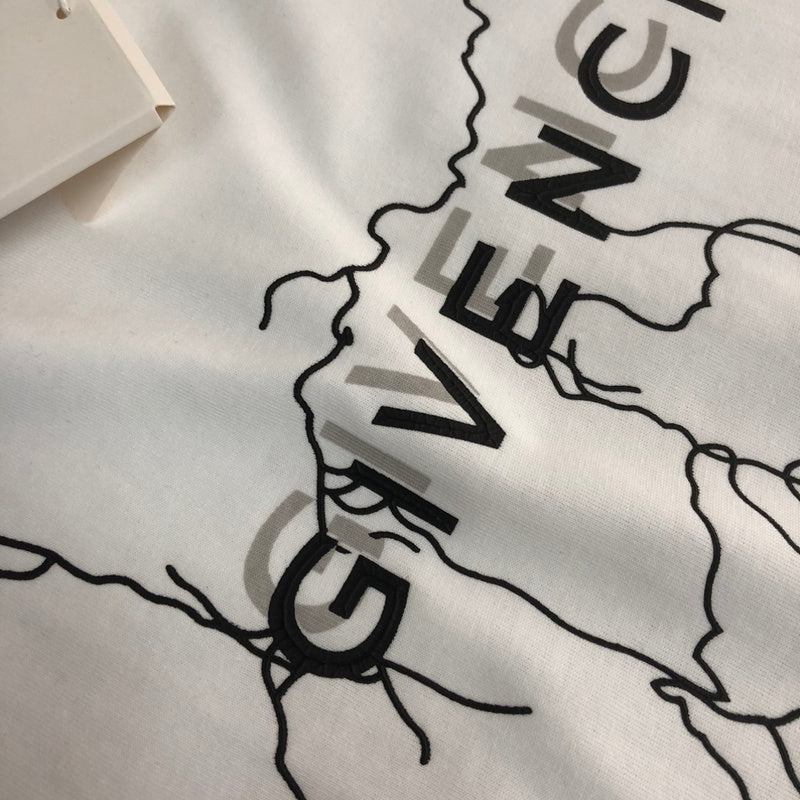 Front view of Givenchy luxury clothing with tailored silhouette
