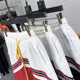 Back view of Rhude luxury clothing with label-forward styling