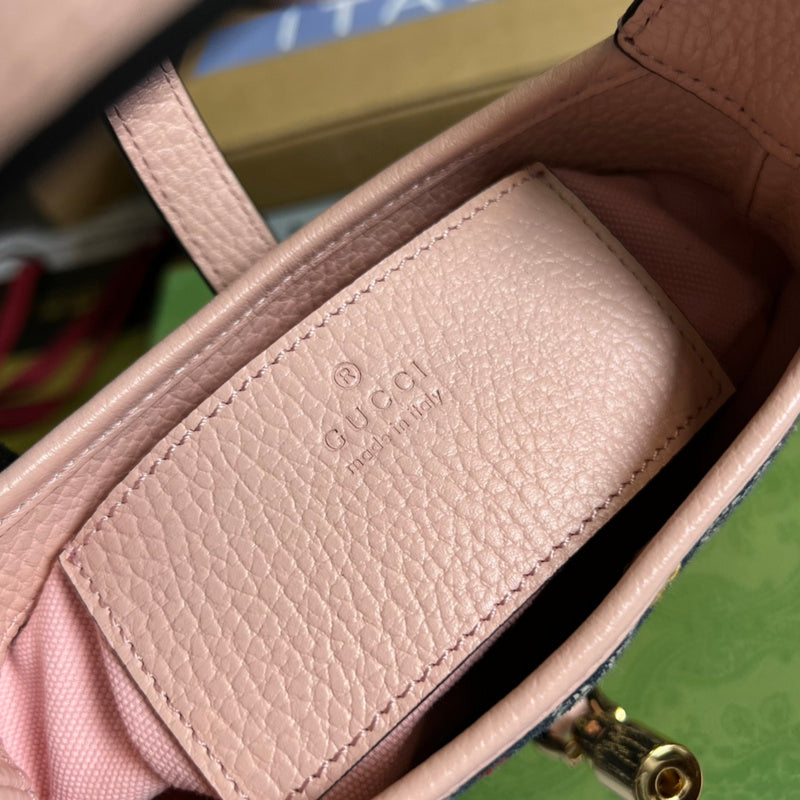 Side profile of statement refined women's handbag – women's luxury accessory