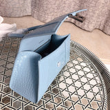Front view of polished classic women's handbag – women's luxury accessory