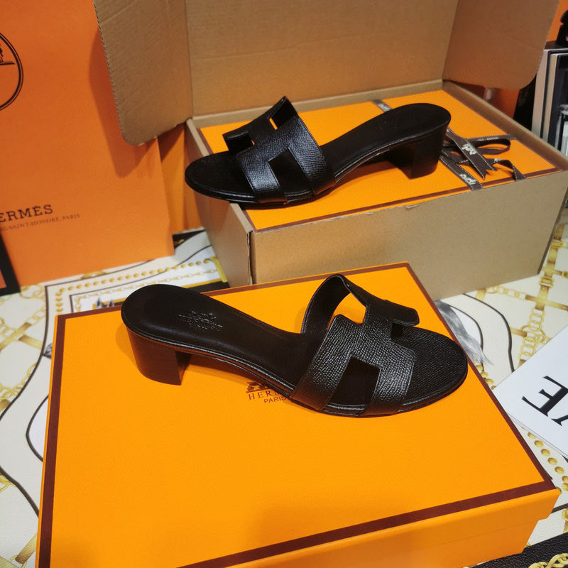 Hermès Black Slide Sandals - Detail Shot of Craftsmanship