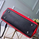 Styled lifestyle shot of chic polished women's handbag – women's statement bag