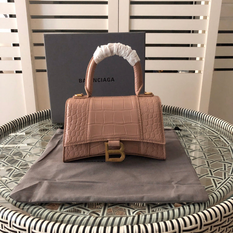 Styled lifestyle shot of polished elevated women's handbag – women's luxury accessory