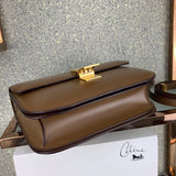Styled lifestyle shot of modern classic women's handbag – women's luxury accessory