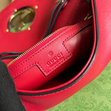 Side profile of sleek classic women's handbag – women's statement bag