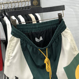 Back view of Rhude luxury clothing with streetwear-inspired cut
