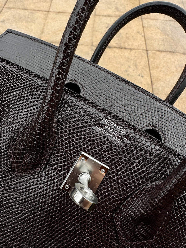 Side view of tailored structured handbag