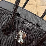 Side view of tailored structured handbag