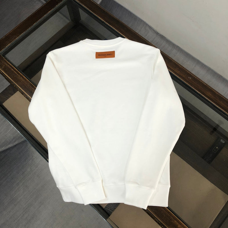 Close-up detail shot of Louis Vuitton luxury clothing with relaxed-fit cut