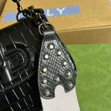 Close-up detail of everyday-luxe sleek women's handbag – women's luxury accessory