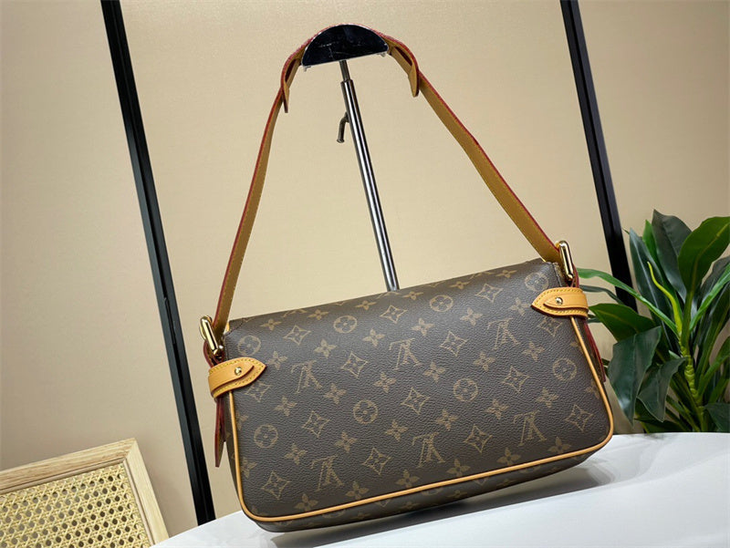  polished top-handle bag detail view showing craftsmanship