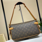  polished top-handle bag detail view showing craftsmanship