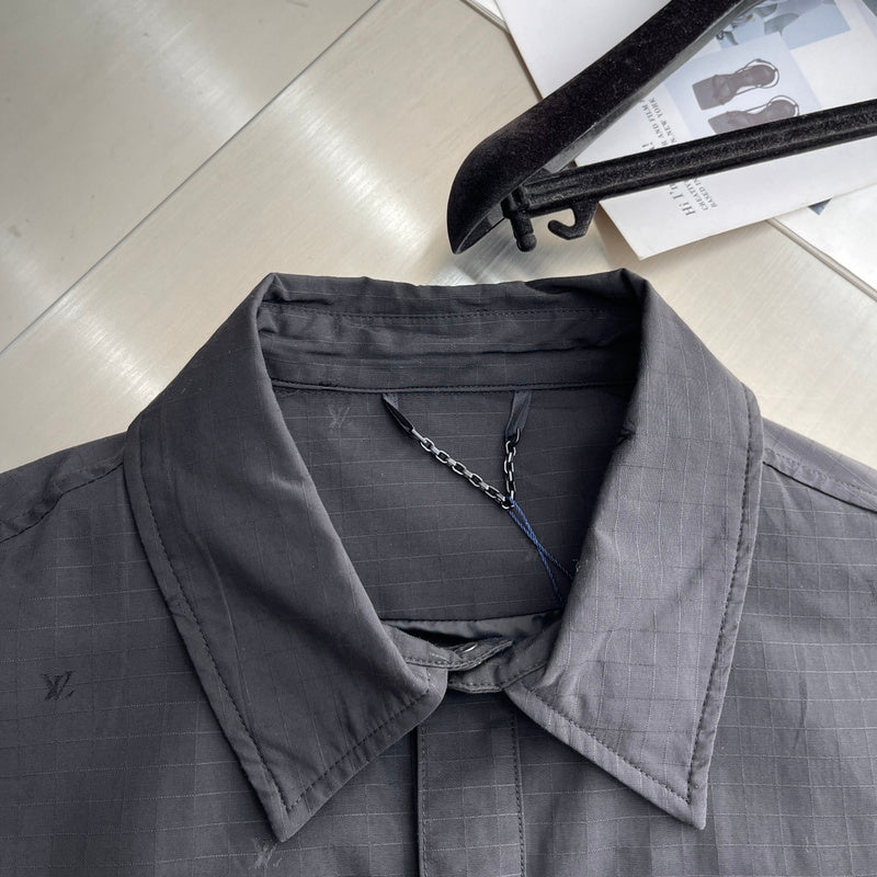 Close-up detail shot of Louis Vuitton luxury clothing with contemporary cut