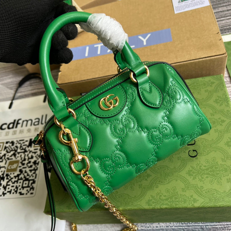 Front view of chic polished women's handbag – women's statement bag