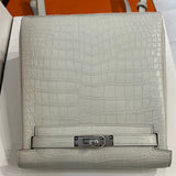 Side view of sculpted structured handbag