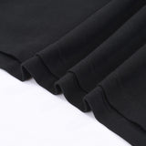 Close-up detail shot of Polo cotton polo shirt with monogram-inspired silhouette