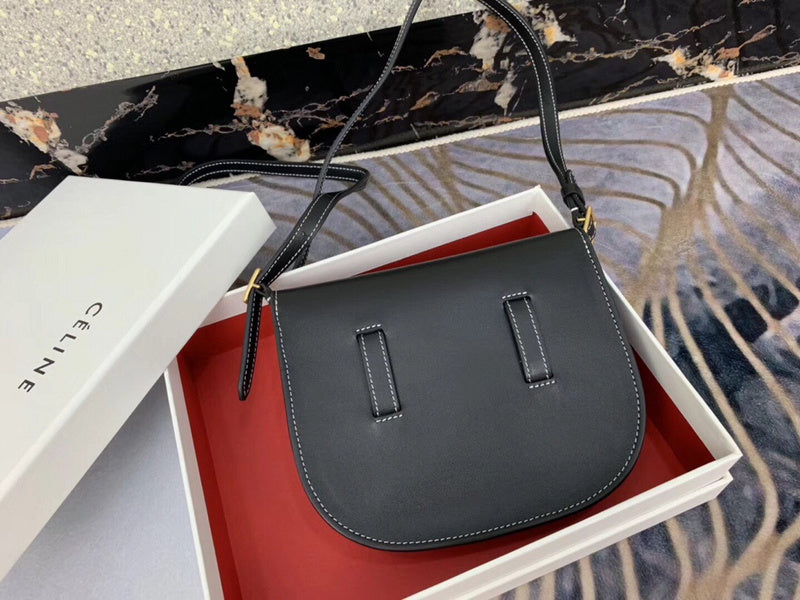 Styled lifestyle shot of polished statement women's handbag – women's premium purse