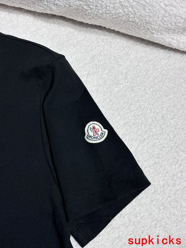 Full styled look of Moncler luxury clothing with monogram-inspired silhouette