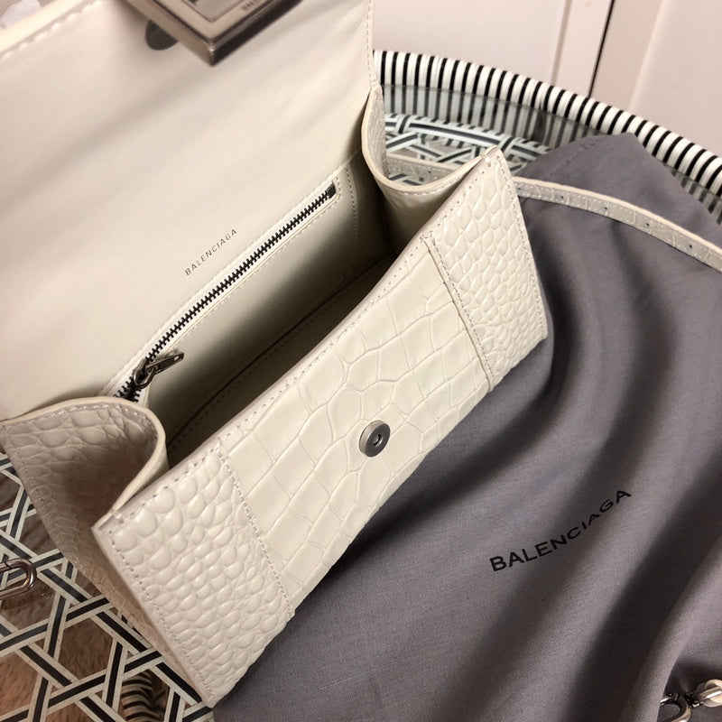 Front view of modern polished women's handbag – women's designer-style accessory