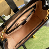 Side profile of elevated classic women's handbag – women's designer-style accessory