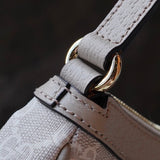 Side profile of Gucci Fashion Item showcasing structured silhouette