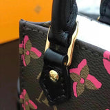 Back view of polished chic women's handbag – women's designer-style accessory