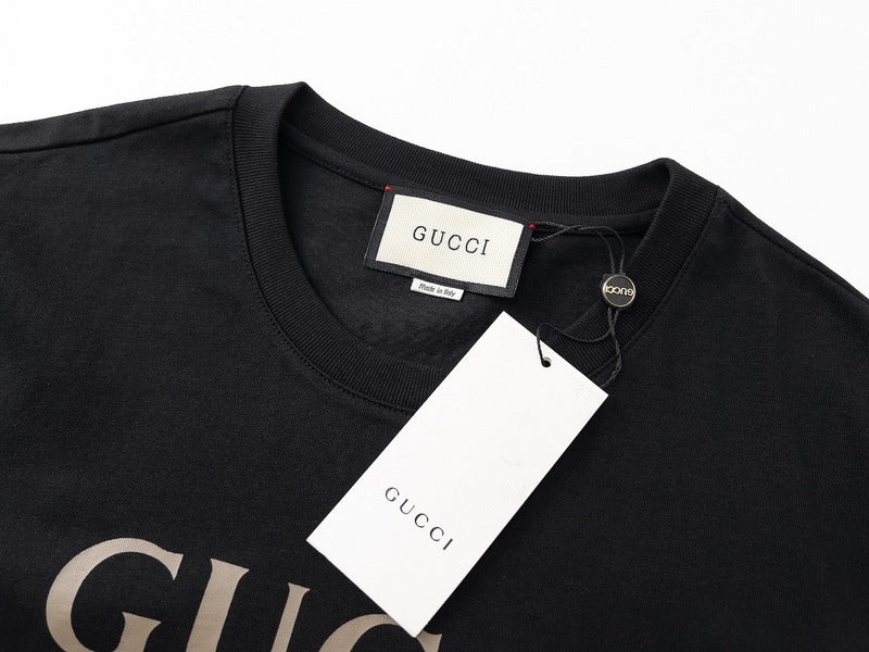 Flat lay presentation of Gucci luxury clothing with runway-inspired design