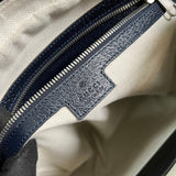 Side profile of premium modern women's handbag – women's statement bag