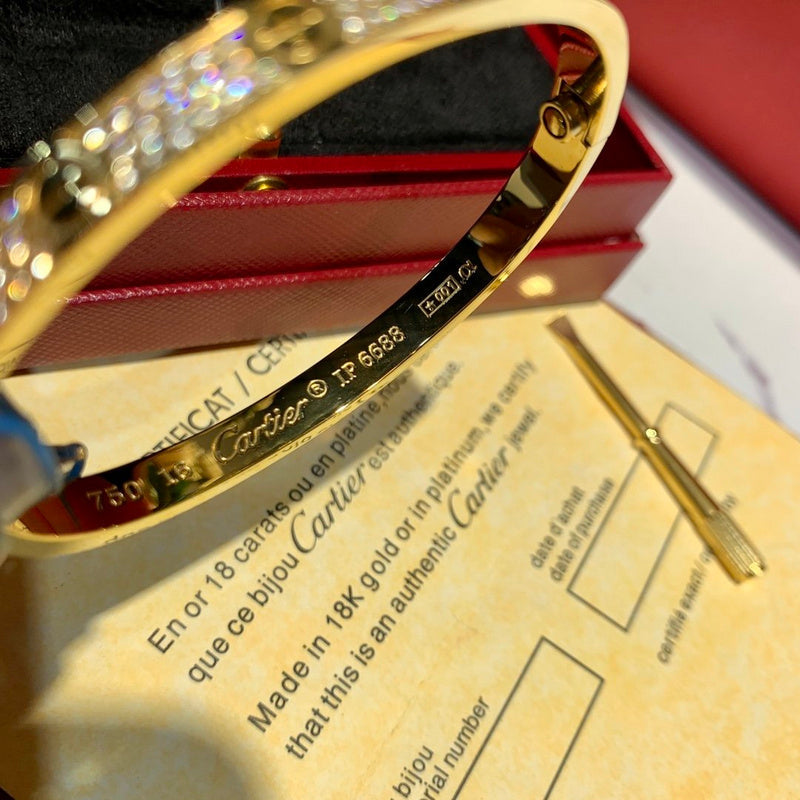 Close-up detail view of Cartier unisex jewelry piece