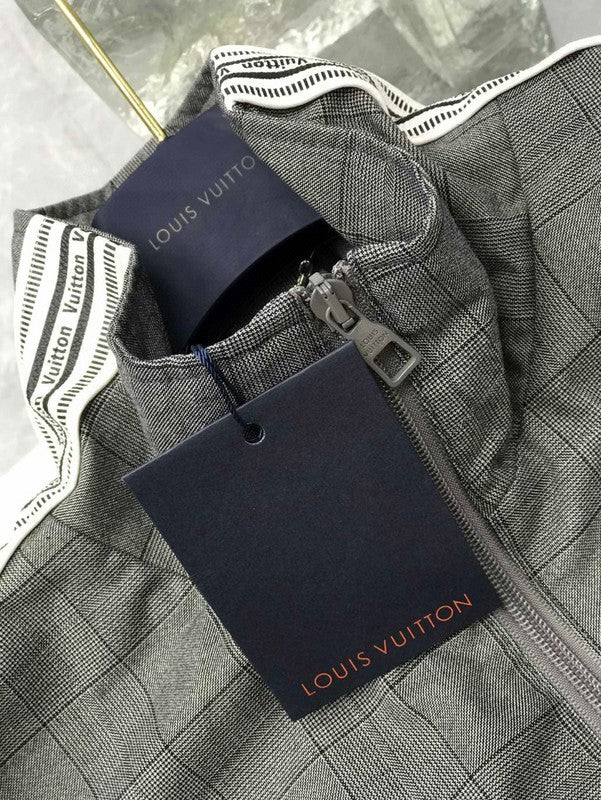 Flat lay presentation of Louis Vuitton luxury clothing with relaxed-fit cut