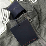 Flat lay presentation of Louis Vuitton luxury clothing with relaxed-fit cut