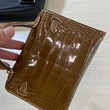 Side view of sophisticated structured handbag