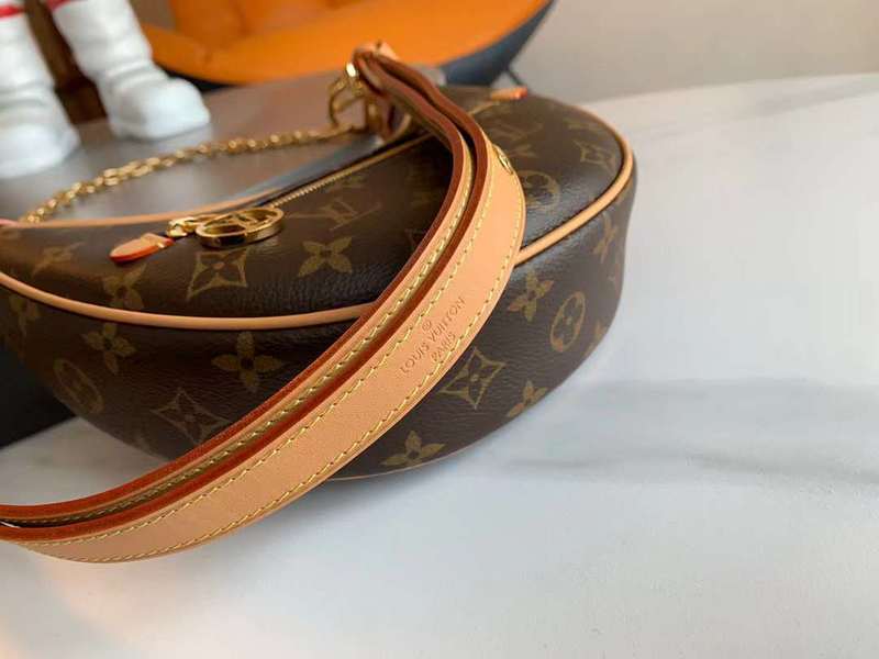 Front view of sleek classic women's handbag – women's designer-style accessory