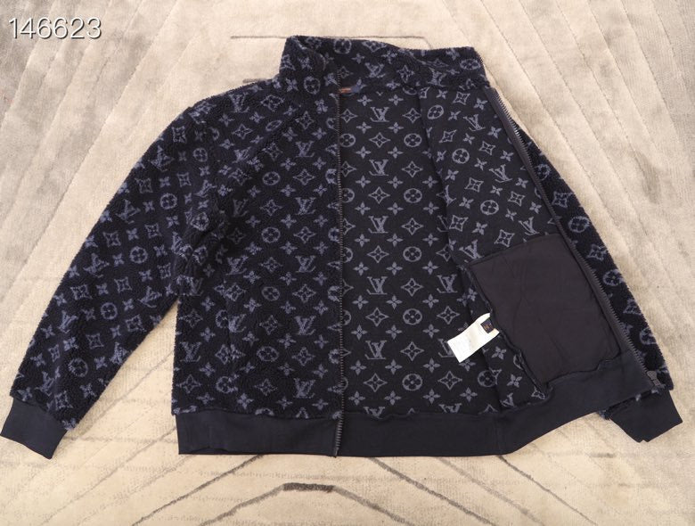 Close-up detail shot of Louis Vuitton luxury clothing with tailored silhouette