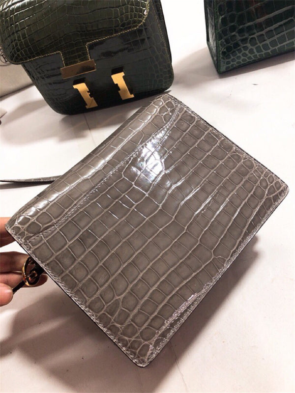  Clean-Lined top-handle bag carried on shoulder 16