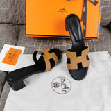 Hermès Grey Slide Sandals - Angled View