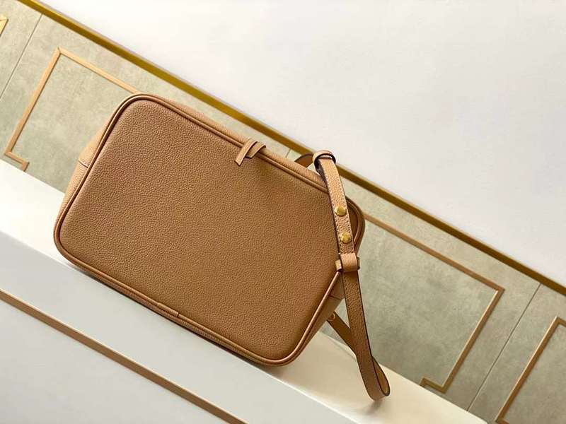 Styled lifestyle shot of modern structured women's handbag – women's luxury accessory