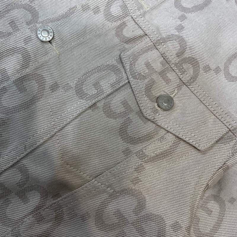 Flat lay presentation of Gucci luxury clothing with logo-detail design