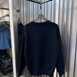 Flat lay presentation of Louis Vuitton luxury clothing with streetwear-inspired cut